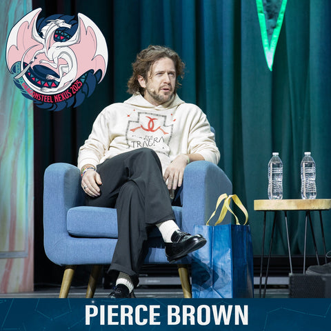 Pierce Brown enjoys a comfortable chair and a bottle of water. 