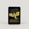 A black ebook device shown on a light gray background. the device is displaying the cover for 'Isles of the Emberdark' by Brandon Sanderson, featuring a large single-color golden parrot illustration and gold lettering.
